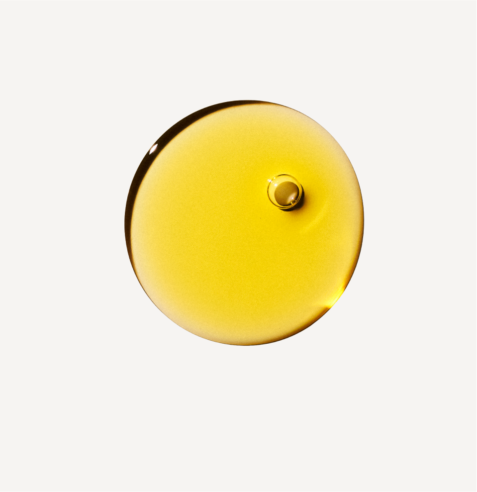 Applying a few drops of hair oil