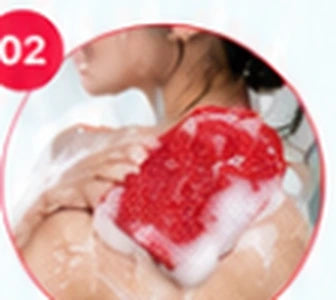 Use the exfoliating glove in a massaging motion